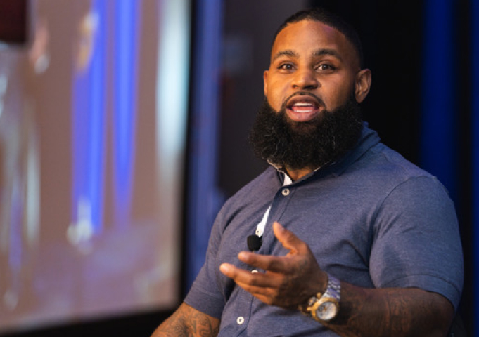 Speaker presenting on stage